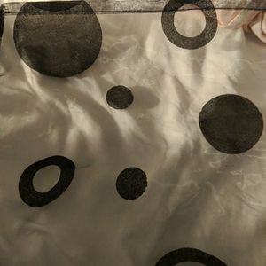 2- Black sheer curtain panels